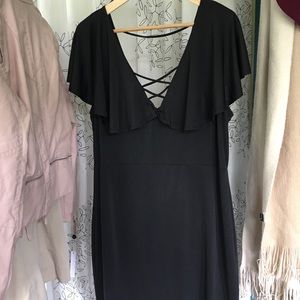 Black bodycon w/plunge neckline & cape